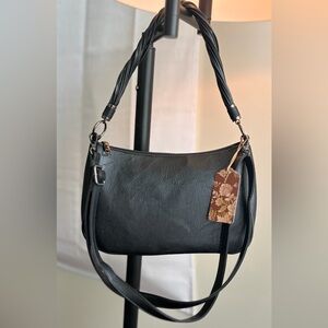 Sleek Black Shoulder Bag with Twisted Handle